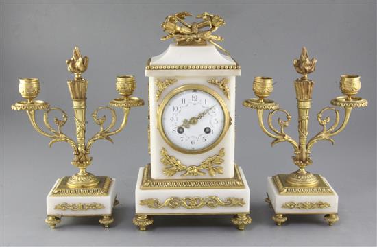 An early 20th century French marble clock garniture, 12in.